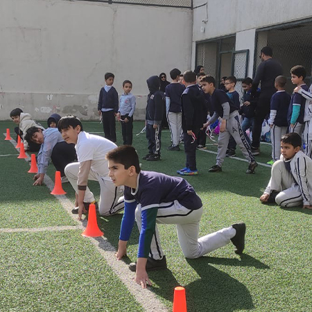 Students enjoying open ground for sports and activities